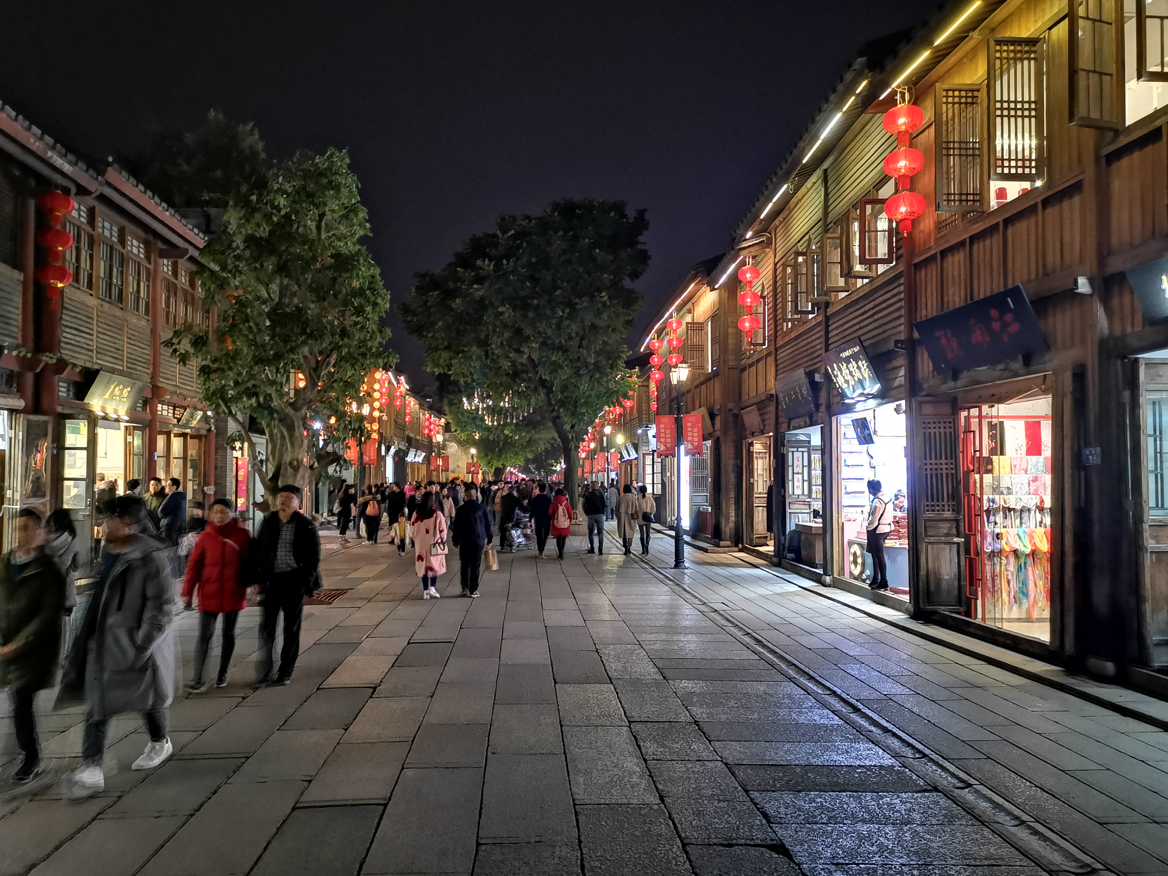 Lantern-lit main street in the Three Lanes and Seven Alleys historic district
