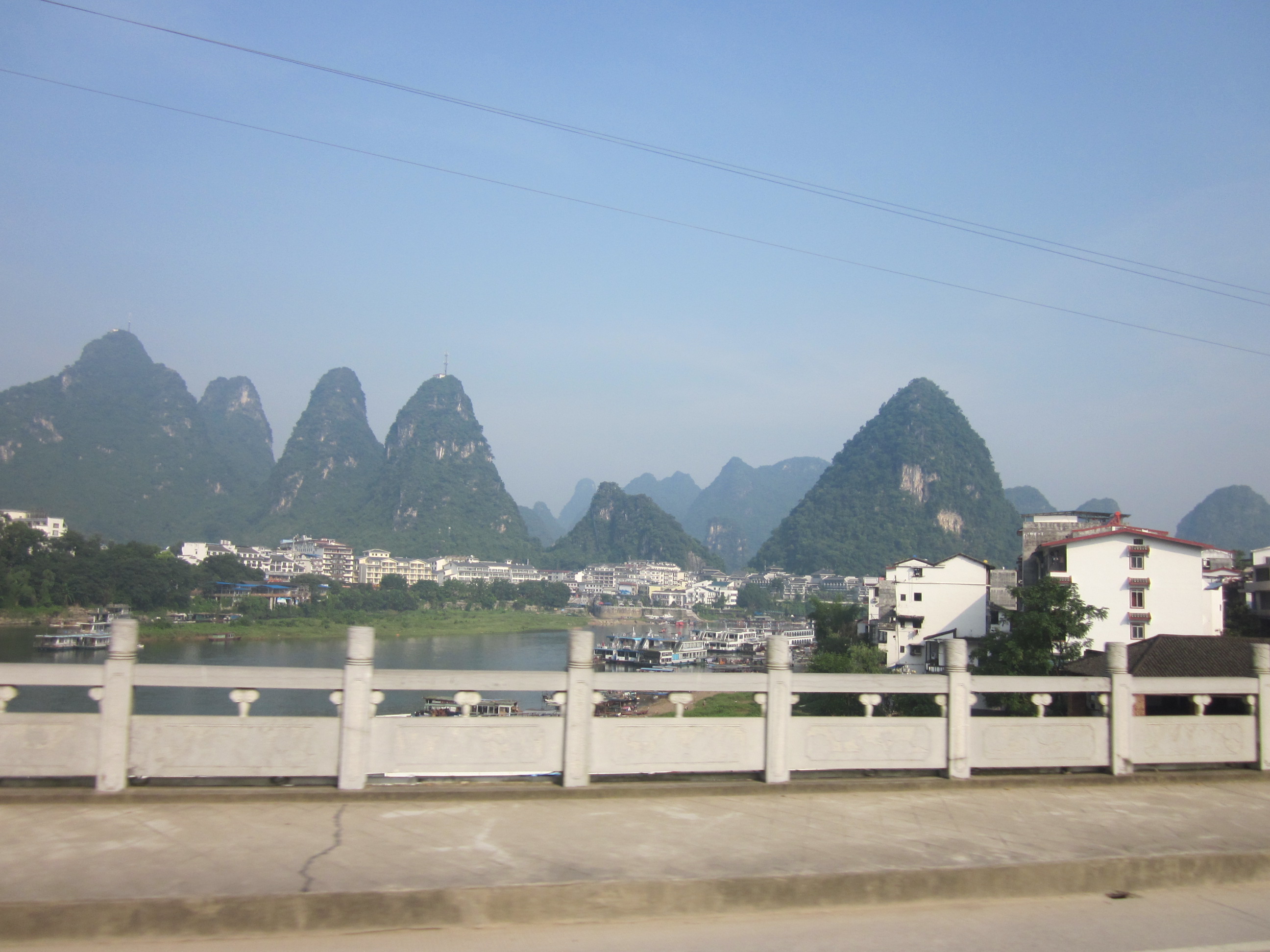 Karst mountains rising behind the Li River in Yangshuo County near Guilin