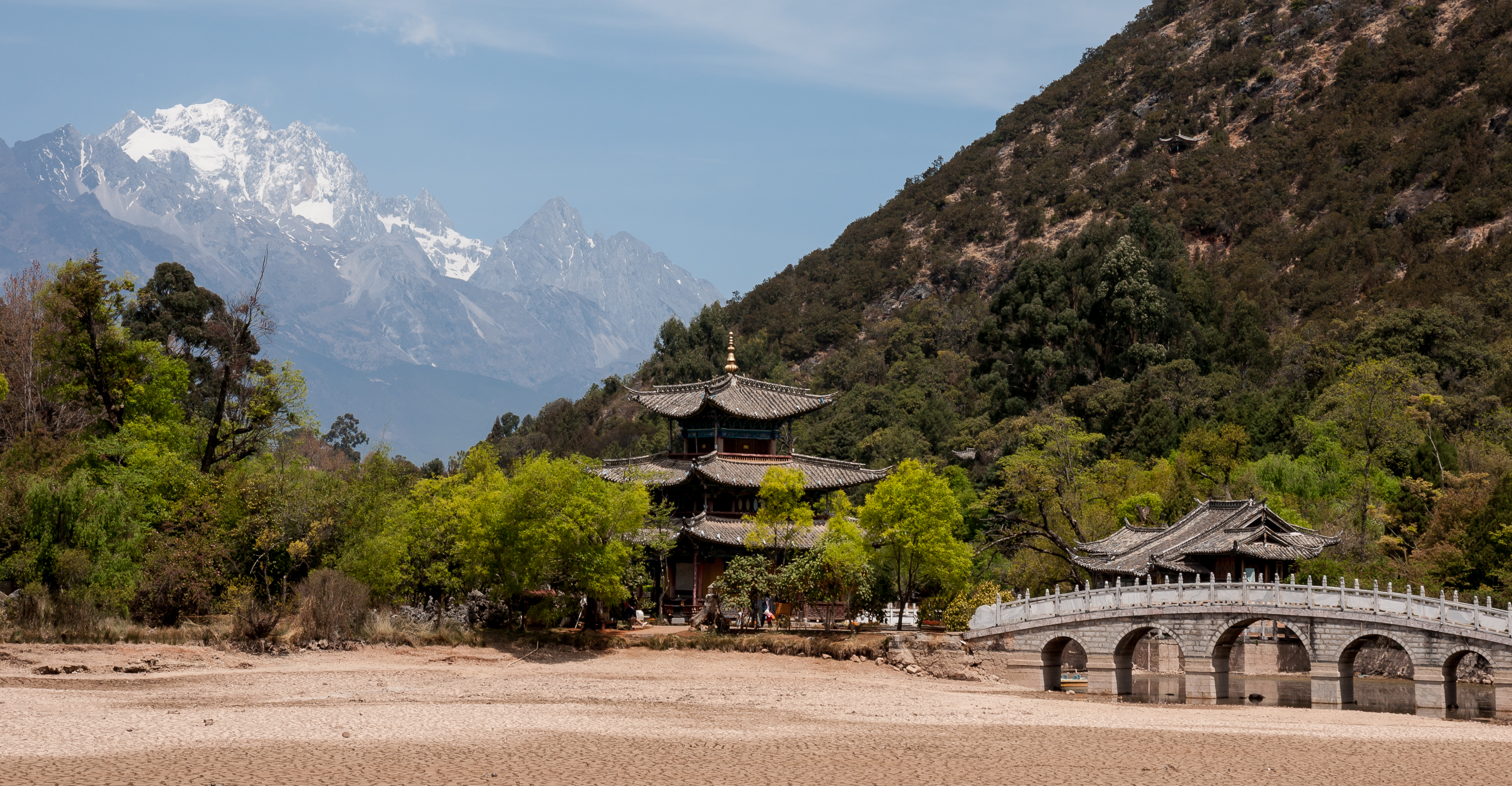 Black Dragon Pool pavilions with Jade Dragon Snow Mountain behind them in Lijiang