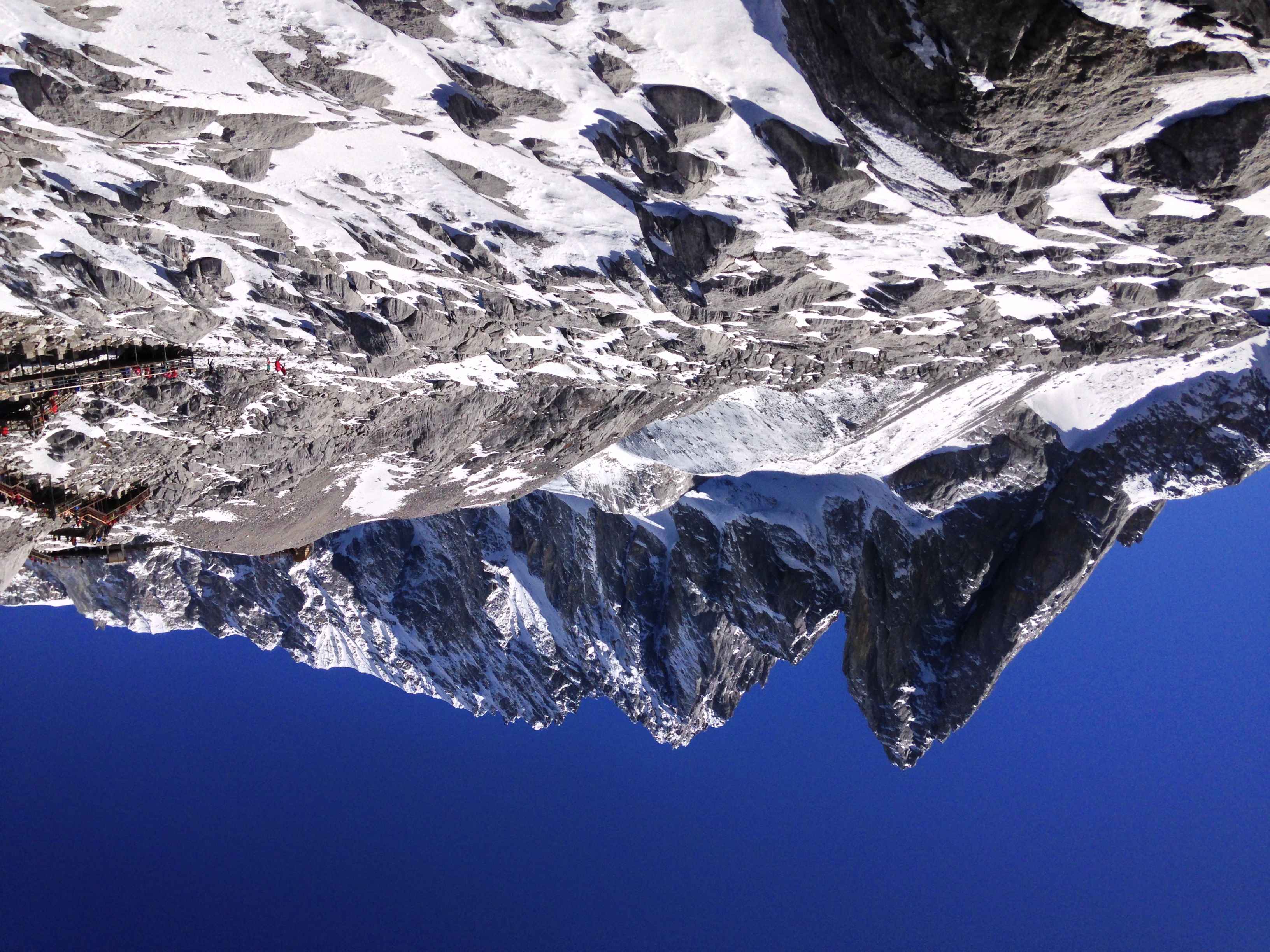 Snow-covered peaks and rocky slopes on Jade Dragon Snow Mountain near Lijiang