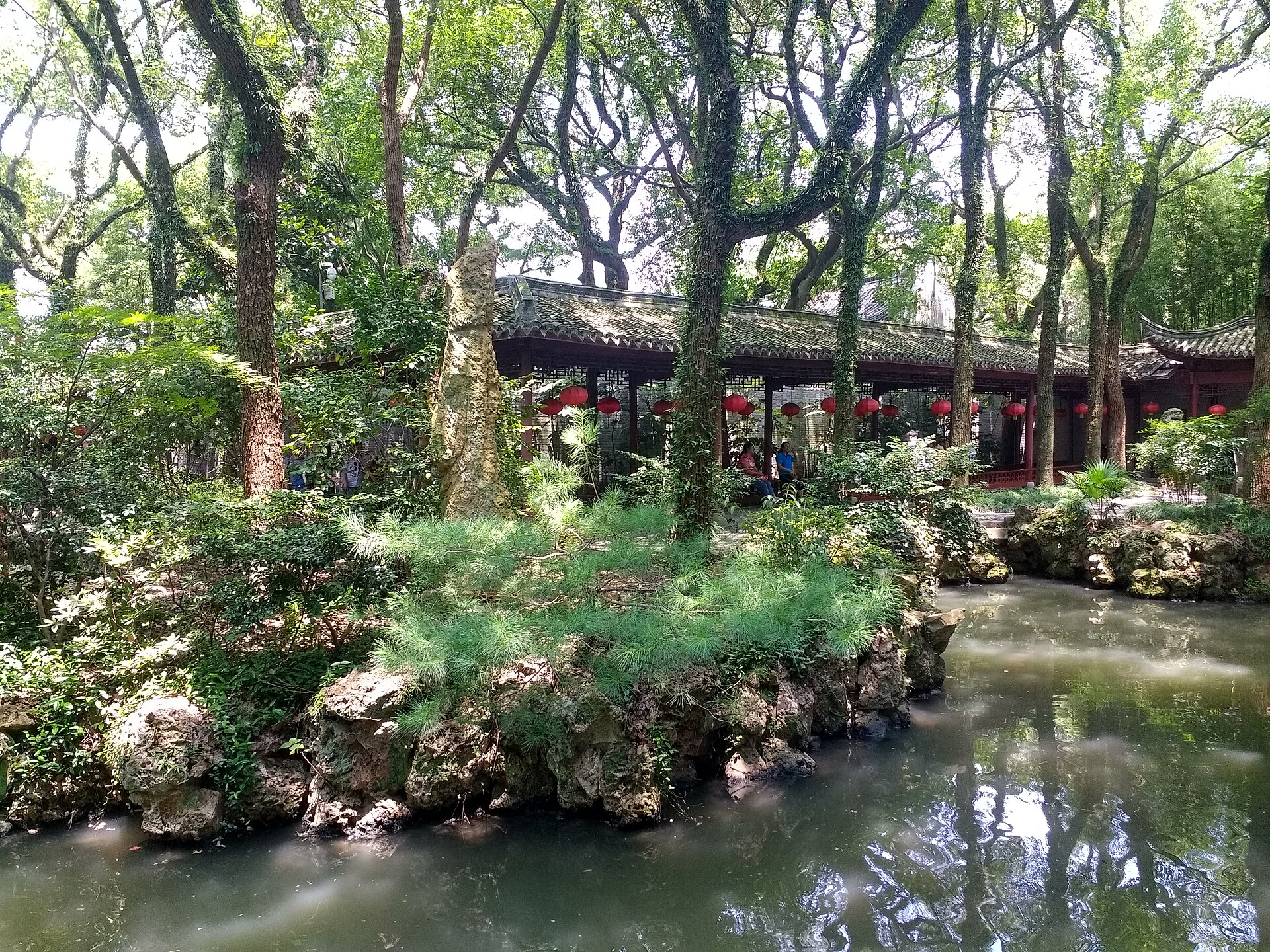 Traditional halls, stone paths, and greenery at Tianyi Pavilion