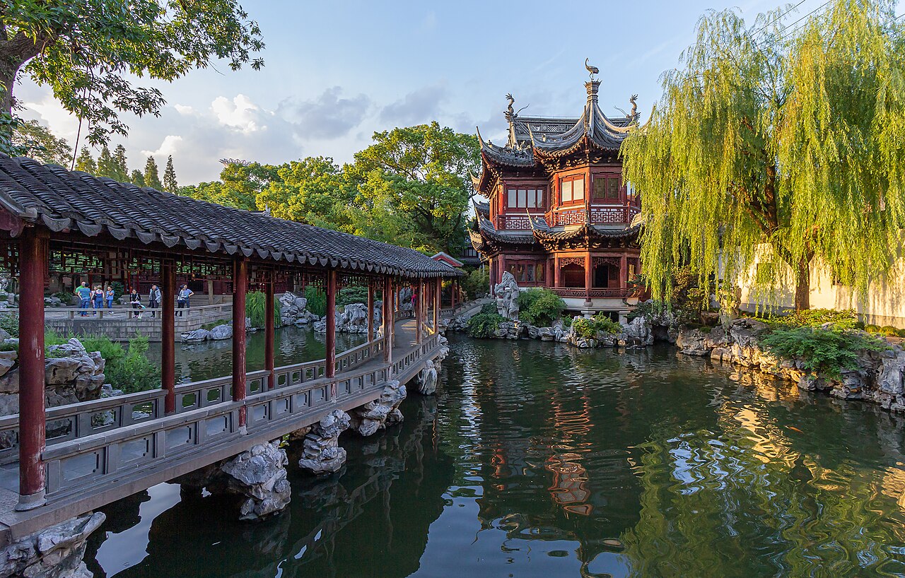Yu Garden buildings, pond, and zigzag bridge in Shanghai