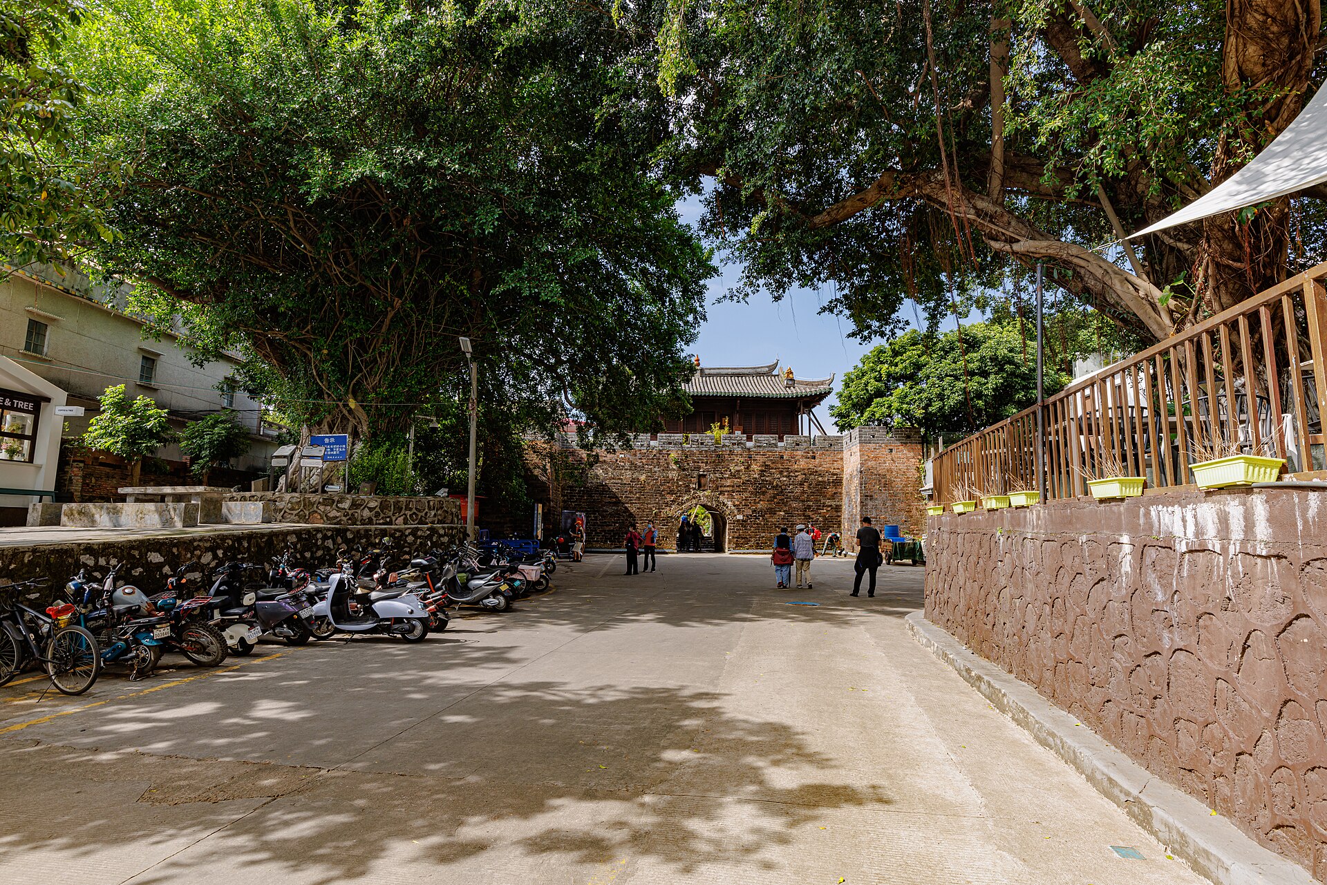 Stone gate and historic buildings inside Dapeng Fortress in Shenzhen