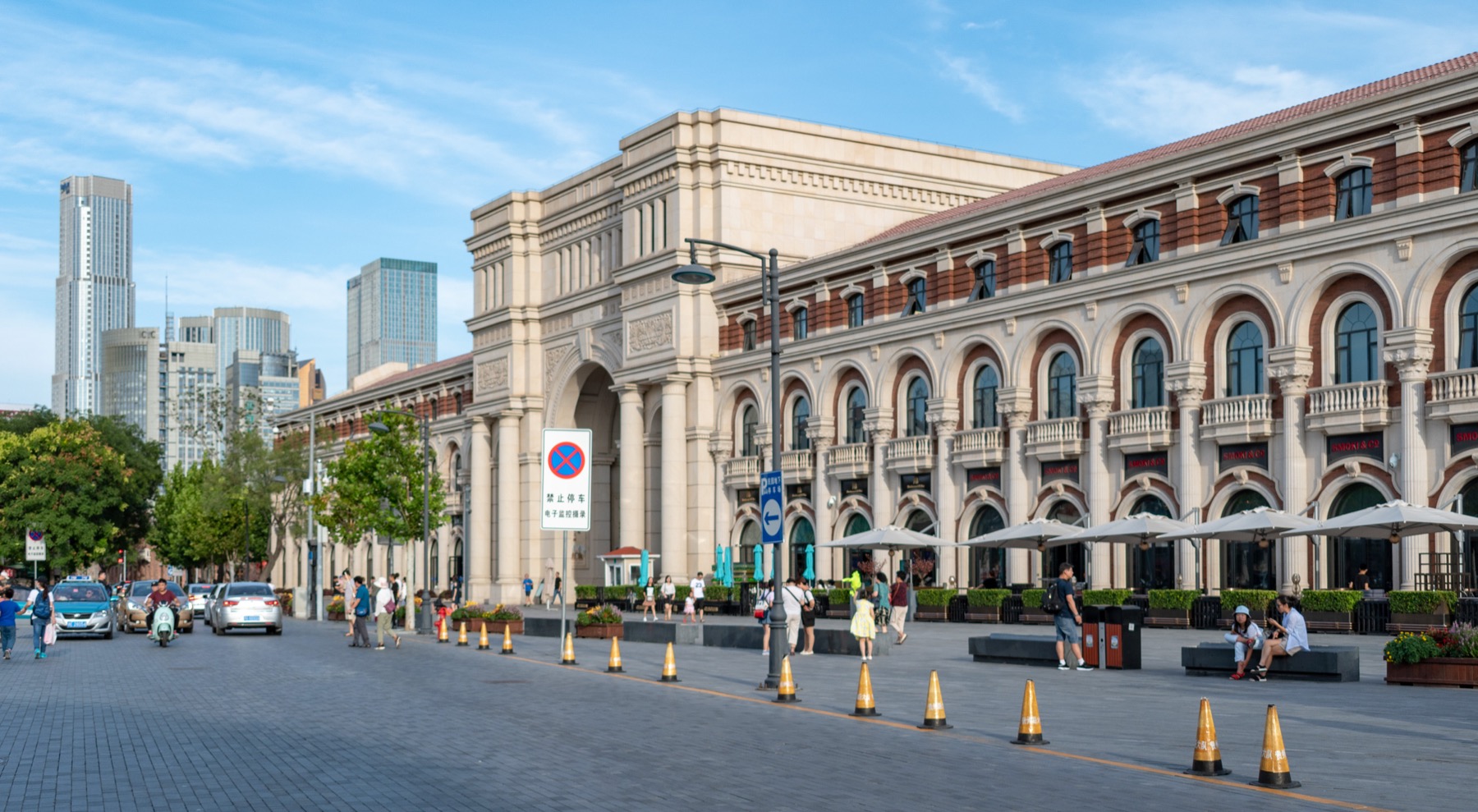 Tree-lined street and historic buildings in Tianjin's Five Great Avenues district