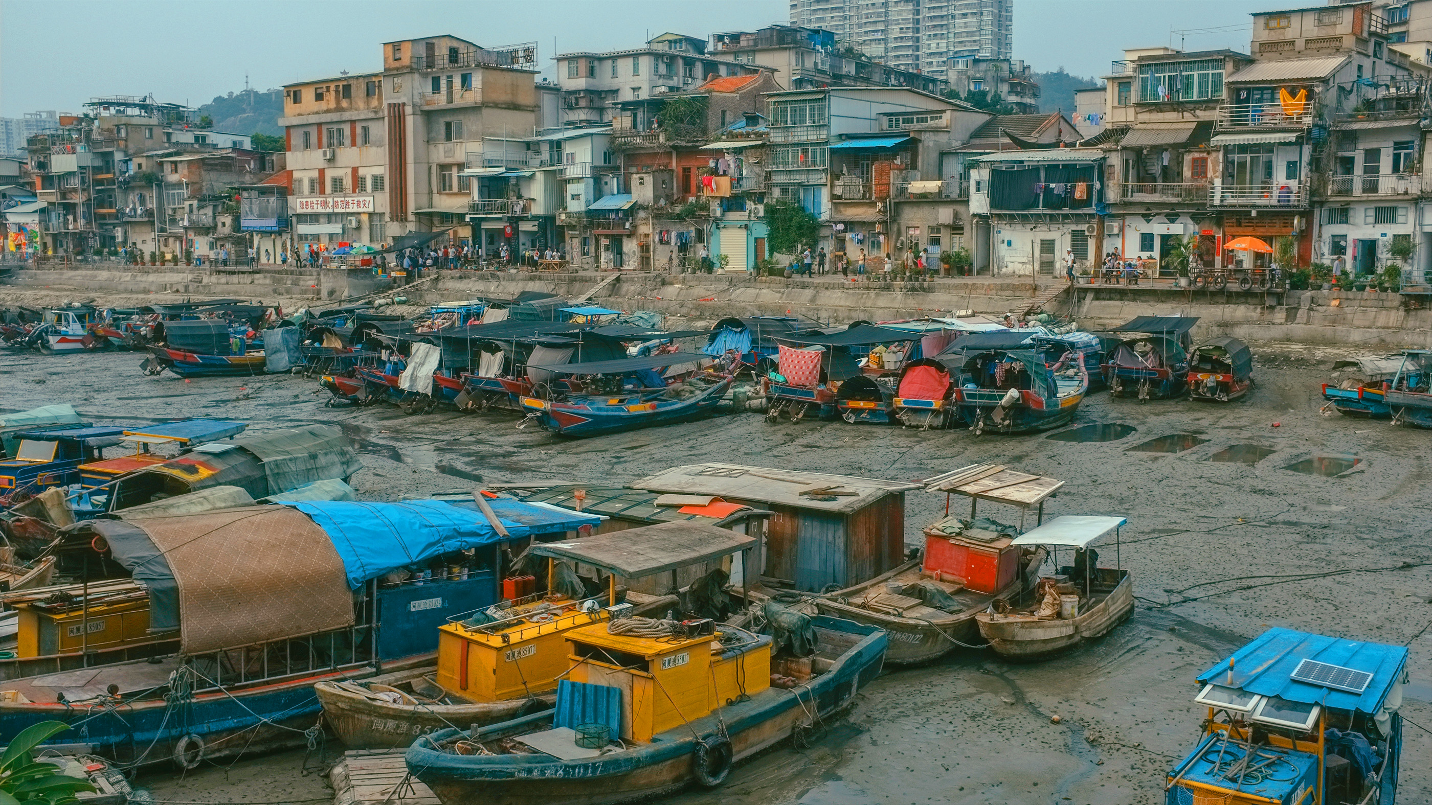 Fishing boats moored in the old harbor at Shapowei in Xiamen